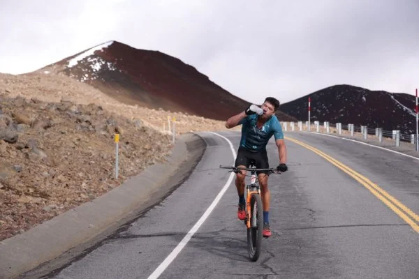 cyclist climbing steep hill
